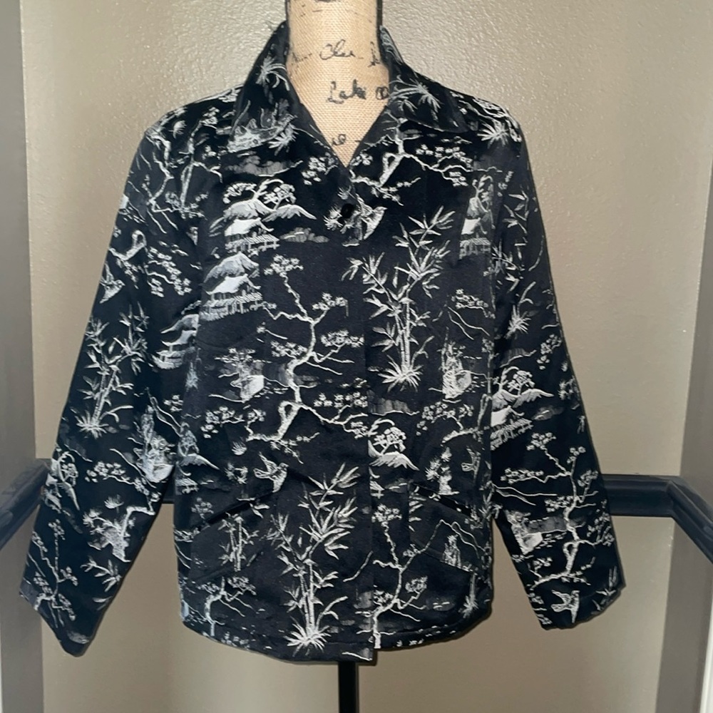 Chico’s Size 2 (12) black and white button down jacket.